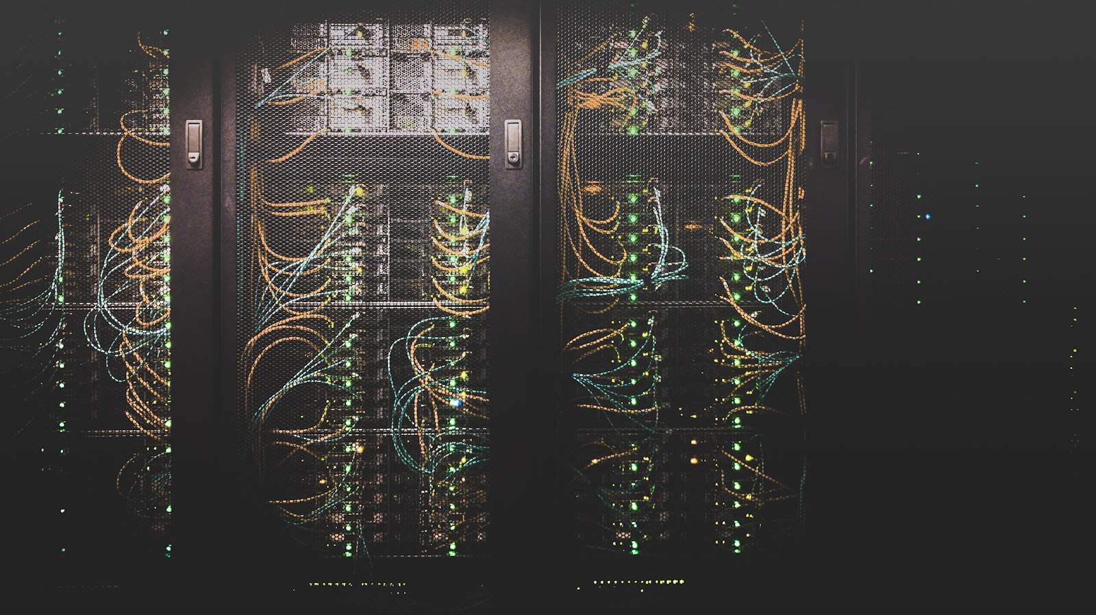 Modern datacenter with server racks and blue status lights